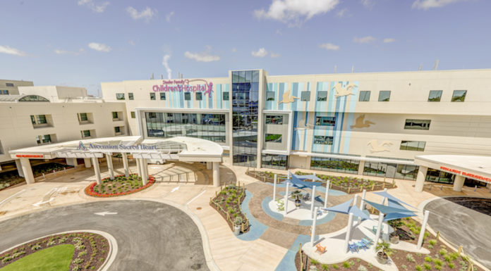 Construction of new children’s hospital addition in NW Florida had to weather several storms