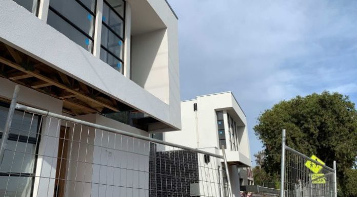 Two building companies collapse amid national housing downturn