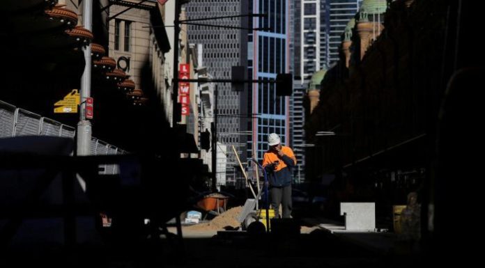 Construction worker has a smoko